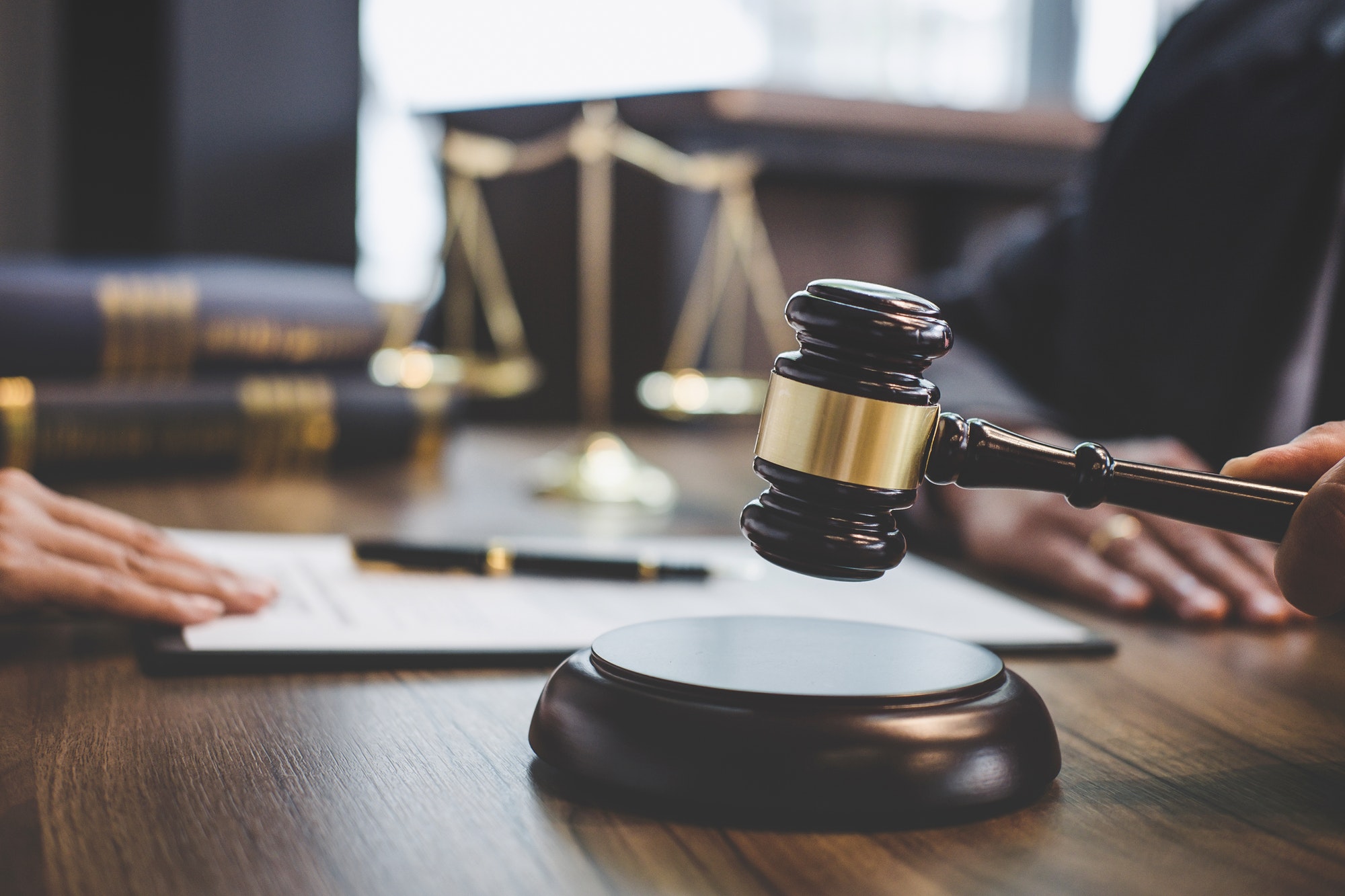 Businesswoman and Male lawyer or judge consult having team meeting with client